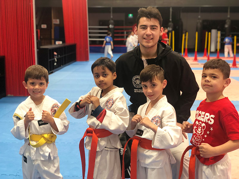 Children returning to martial arts training